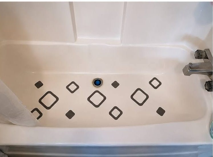 The same bathtub scrubbed clean and bright